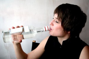 Model drinking Vodka