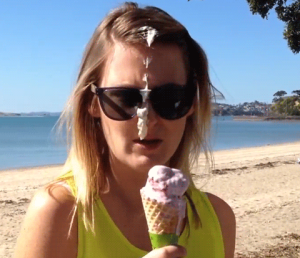 bird poo on girls face while holding ice cream cone