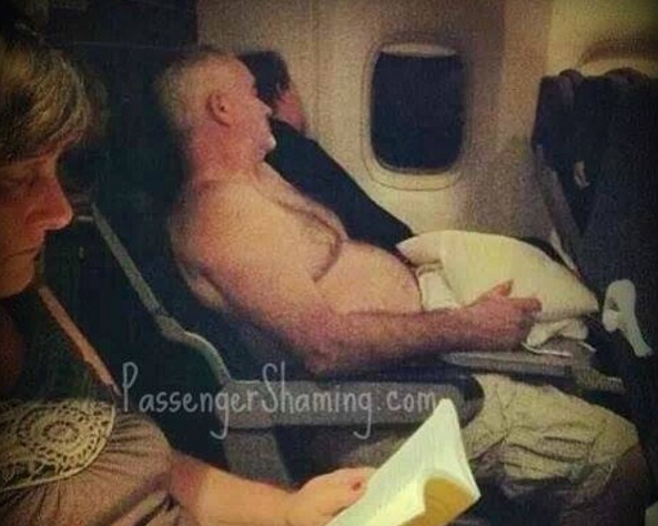 fat old man sleeping shirtless on plane