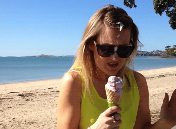 girl freaks out after bird poos on her face while she is eating ice cream